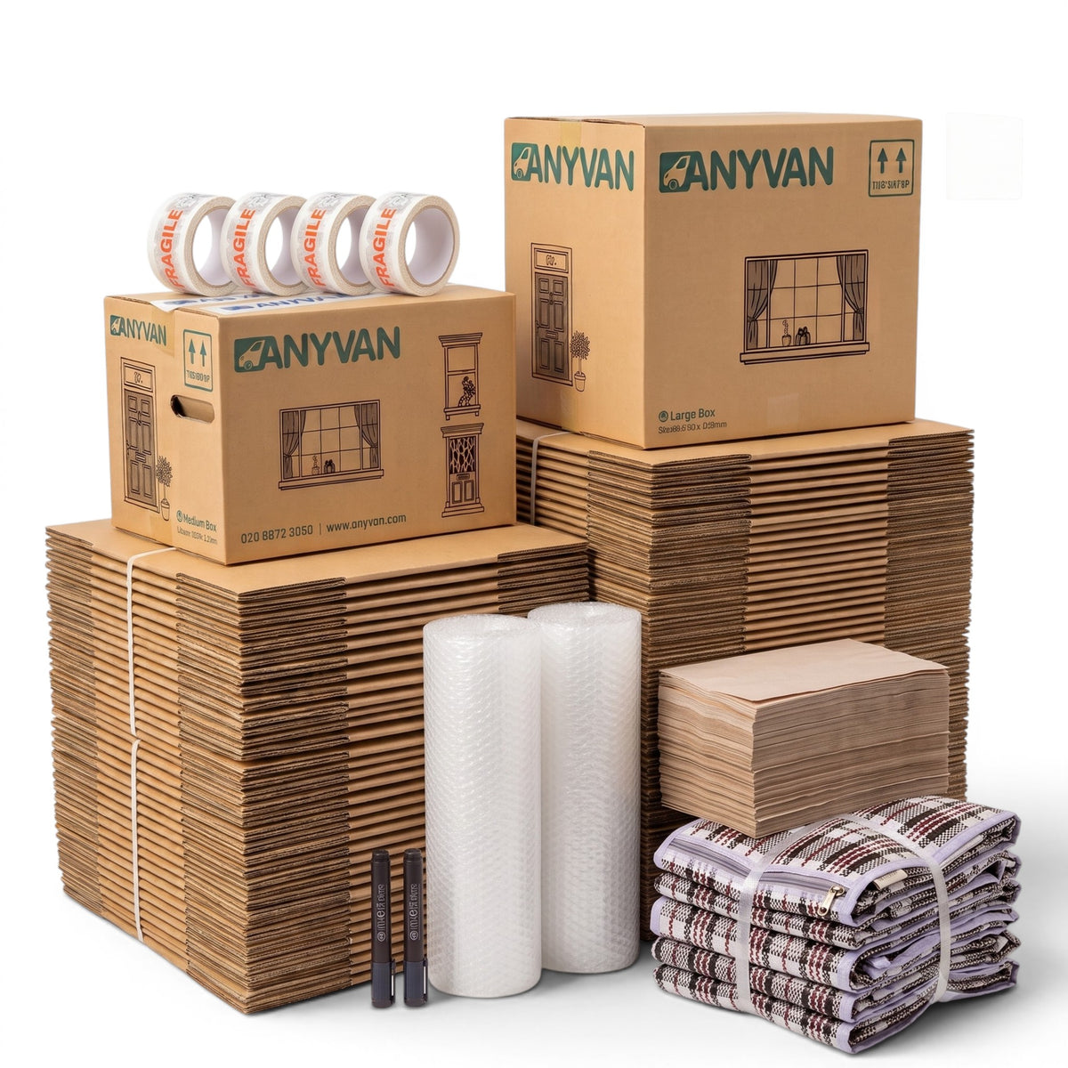 5+ Bed Home Moving Pack contents: tall stacks of flat-packed AnyVan boxes with two assembled boxes, 4 rolls of fragile tape, 2 marker pens, 2 rolls of bubble wrap, packing paper and plaid laundry bags