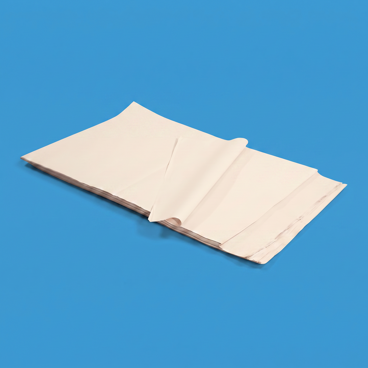 A stack of white packing paper sheets with the top sheet folded back, on a blue background
