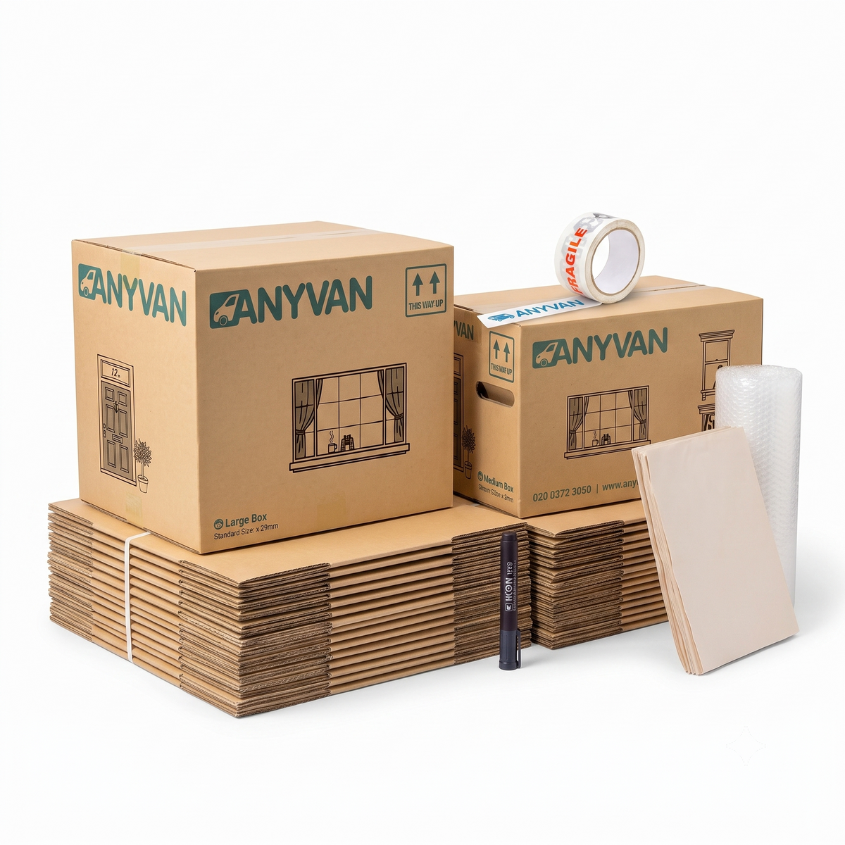 Moving pack contents: an assembled large and medium AnyVan box on stacks of flat-packed boxes, with fragile tape, a marker pen, packing paper and bubble wrap