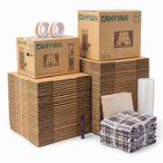 2 Bed Home Moving Pack contents: stacks of flat-packed AnyVan boxes with two assembled boxes, 2 rolls of fragile tape, a marker pen, packing paper, bubble wrap and plaid laundry bags