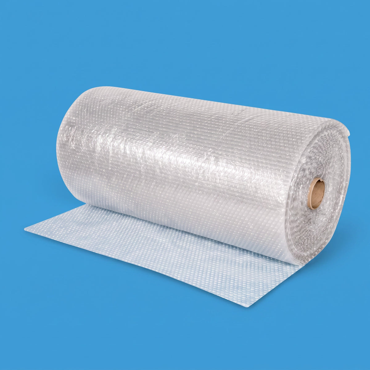 A large roll of clear recycled bubble wrap partly unrolled, on a blue background